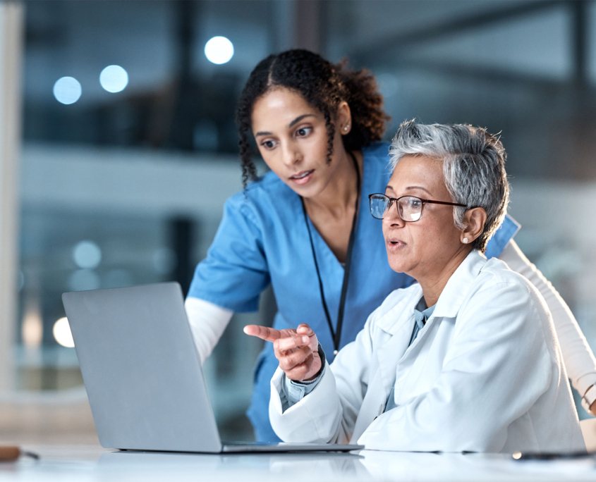 Doctors, nurse or laptop in night healthcare, planning research or surgery teamwork Doctors, nurse or laptop in night healthcare, planning research or surgery teamwork