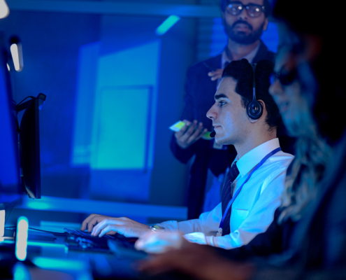 IT professionals on call at computer